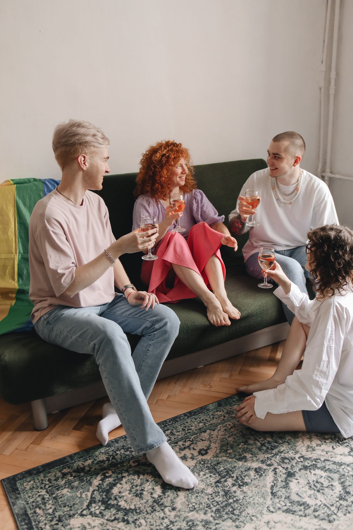 Friends sharing sparkling wine and conversation
